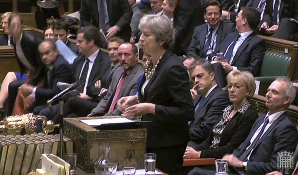 In this image taken from Parliament TV, Britain's Prime Minister Theresa May makes a statement to the House of Commons about the European Council summit, in London, Monday Oct. 22, 2018. May faces dissent from political opponents and from within her own ruling Conservative Party over her blueprint for the Brexit separation and future relations with the EU. (Parliament TV via AP)