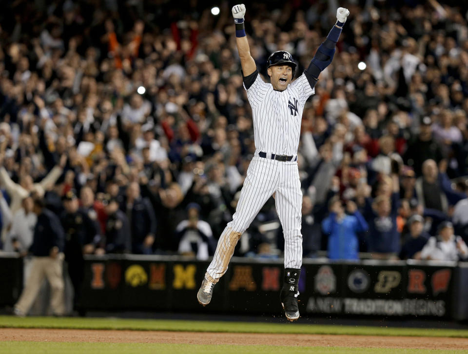 10ThingstoSeeSports - New York Yankees' Derek Jeter jumps after hitting the game-winning single against the Baltimore Orioles in the ninth inning of a baseball game, Thursday, Sept. 25, 2014, in New York. The Yankees won 6-5. (AP Photo/Julie Jacobson, File)
