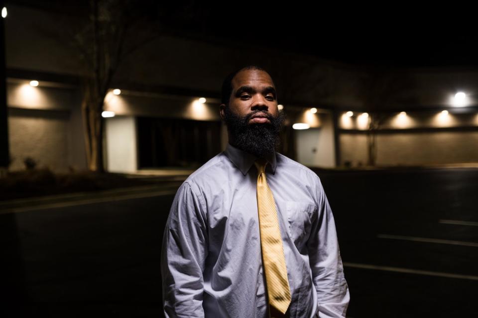 RALEIGH, NC-FEBRUARY 7TH: Blake Banks stands in the parking lot of a former Xerox facility in Raleigh, North Carolina where he was wrongly arrested by Raleigh Police Department.