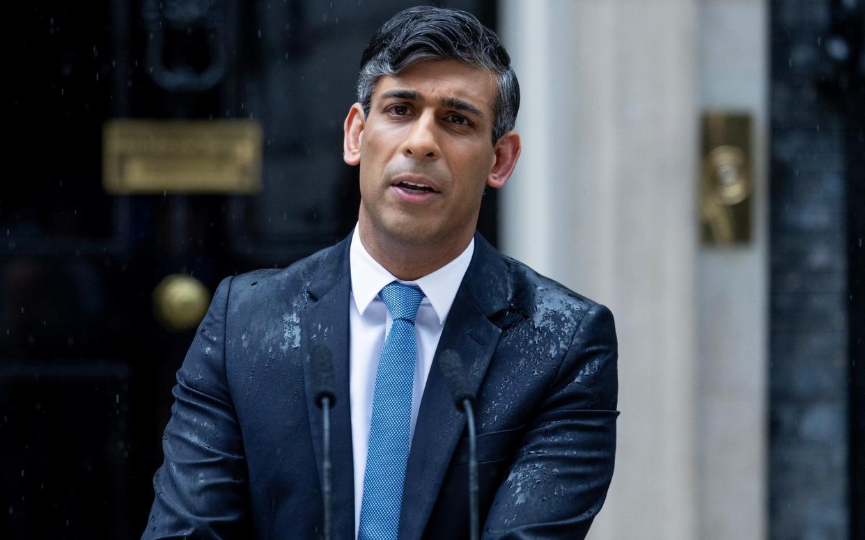 A rain-soaked Rishi Sunak announces the date of the general election on May 22