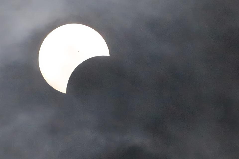 The eclipse was initially visial at the start of the moon moving in but clouds quickly covered the sun during the most dramatiic parts of the transformation.