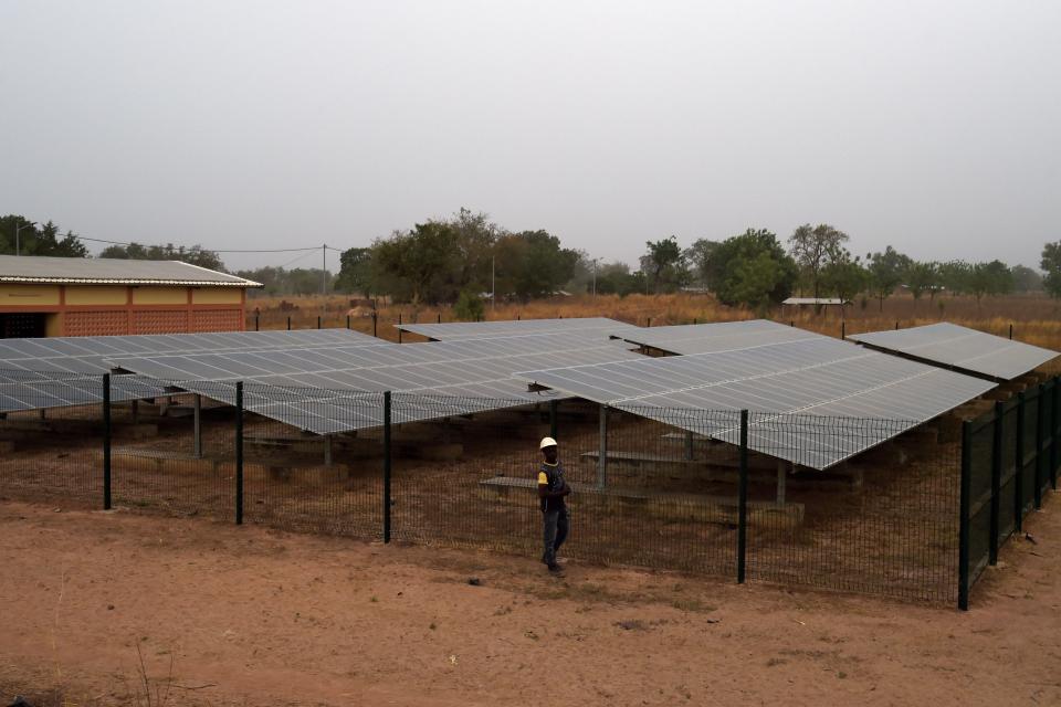 A solar panel mini-grid installed in Takpapieni village in northern Togo, West Africa, on February 14, 2020. (Photo: PIUS UTOMI EKPEI/AFP via Getty Images)