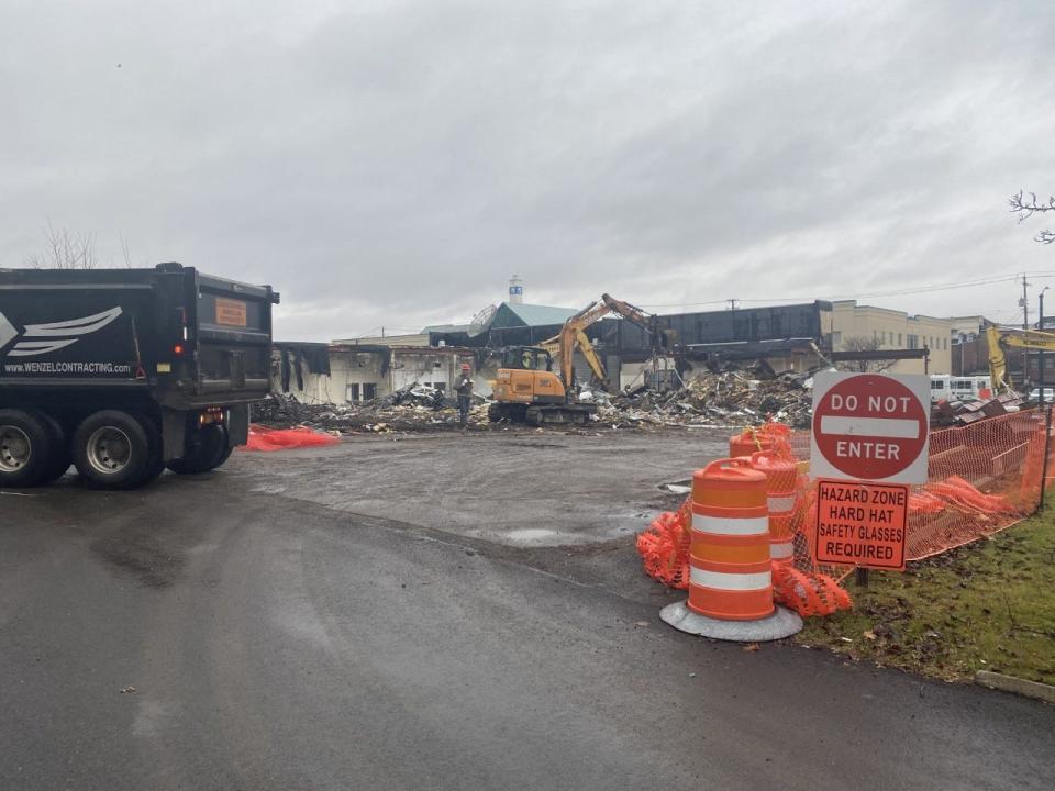 Crews are currently tearing down the former Corning Community College building on West Denison Parkway.