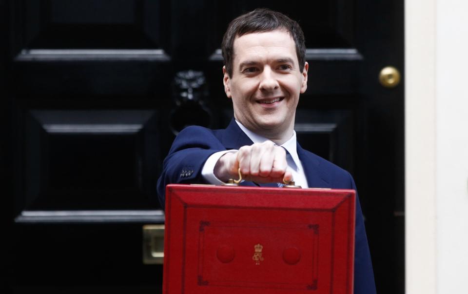 George Osborne, U.K. chancellor of the exchequer, holds the dispatch box containing the budget, as he exits 11 Downing Street in London, U.K., on Wednesday, March 16, 2016. - Simon Dawson/ Bloomberg News