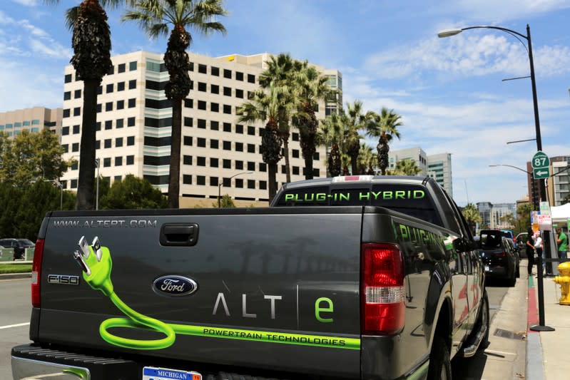 FILE PHOTO: Ford ALTe hybrid electric F-150 pickup truck is shown outside Electric Power Research Institute's Plug-In 2014 conference in San Jose