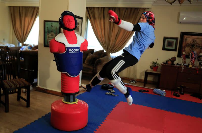 Egyptian Taekwondo practitioner and 2016 Rio Olympics bronze medallist Wahba works out at her home amidst the spread of the coronavirus disease (COVID-19) in Cairo