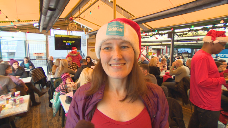 Cheeky Santas dash through Yorkville to raise funds for SickKids Hospital