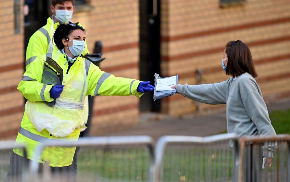 Students from Glasgow University attend a pop-up coronavirus testing centre at Murano Street Student Village - Jeff J Mitchell/Getty