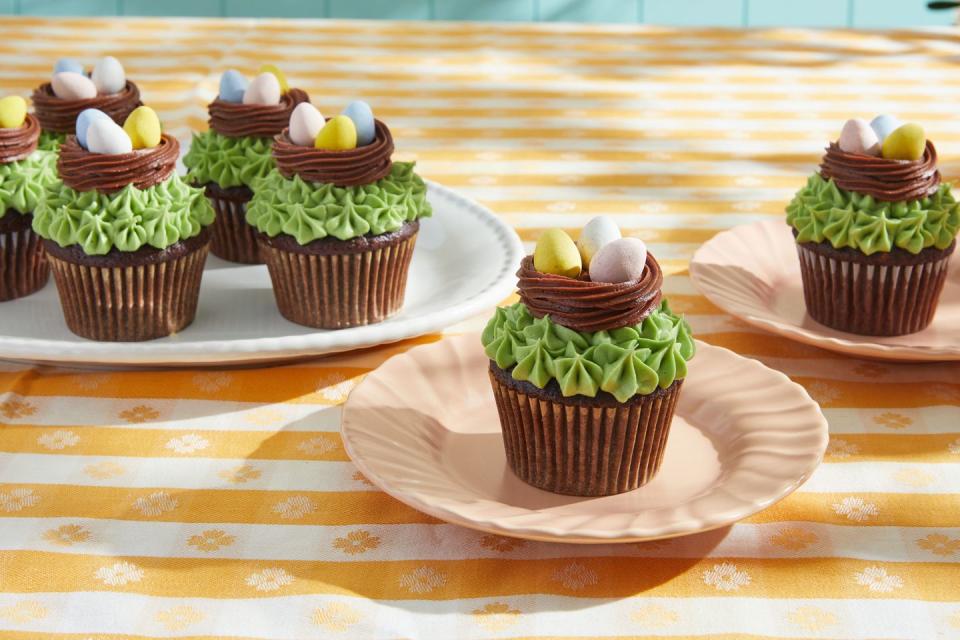 cupcakes with frosting nests and chocolate mini eggs