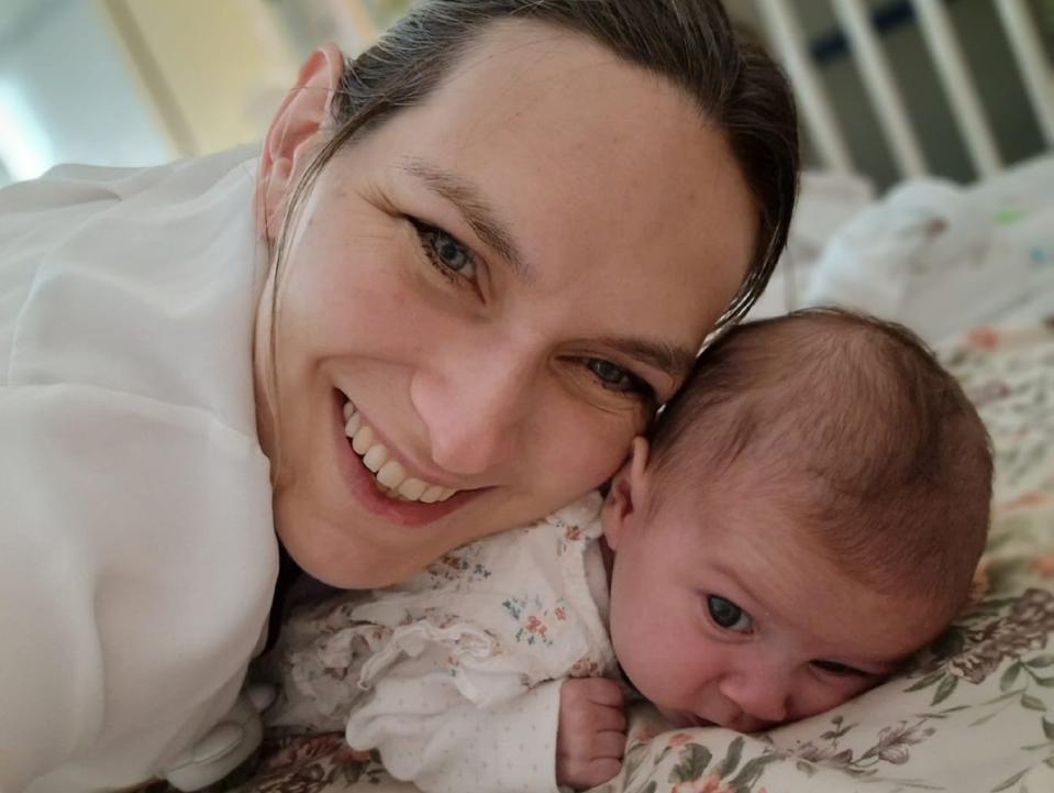 Zofia Fenyrch poses cheek to cheek with her baby, Dorothea, in the hospital