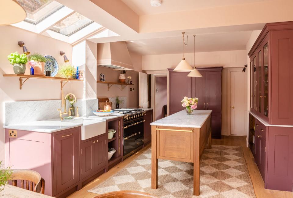 pink and wooden kitchen island