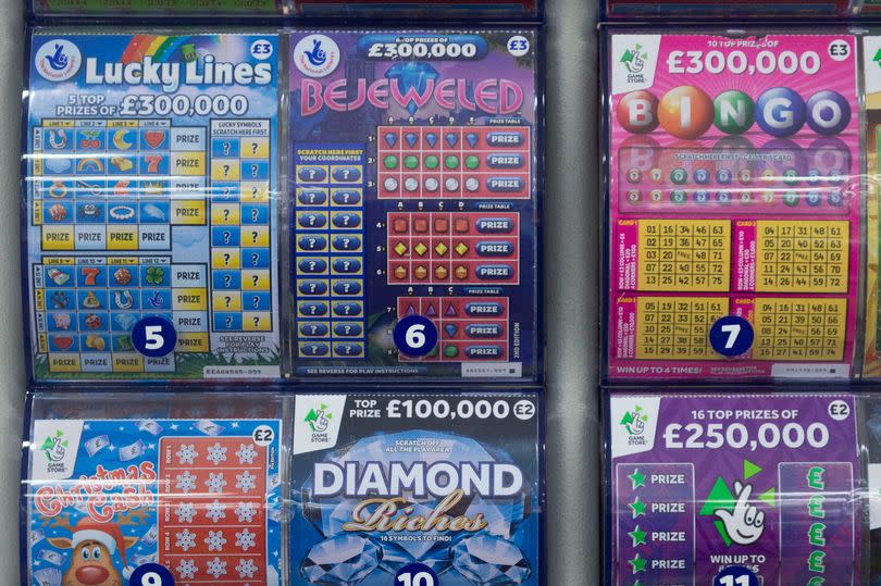 CARDIFF, UNITED KINGDOM - NOVEMBER 12: Scratch cards seen on sale in a shop on November 12, 2015 in Cardiff, United Kingdom. (Photo by Matthew Horwood/Getty Images)