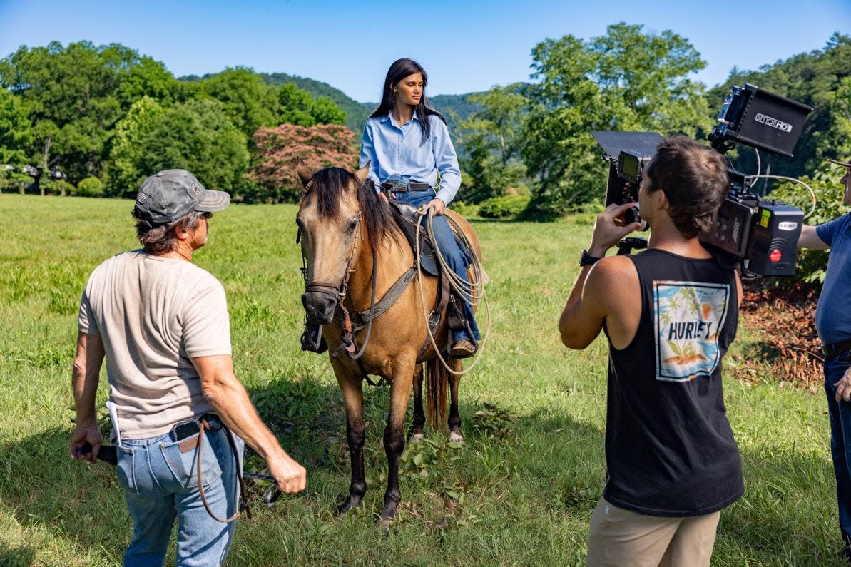 The film crew shoots its "Sylvia Doe and the 100-Year Flood" book trailer project on location in Hot Springs. Haley Thomas on horseback gets directions from stunt coordinator and horse wrangler Tommie Turvey. Thomas plays the title character, Sylvia Doe.