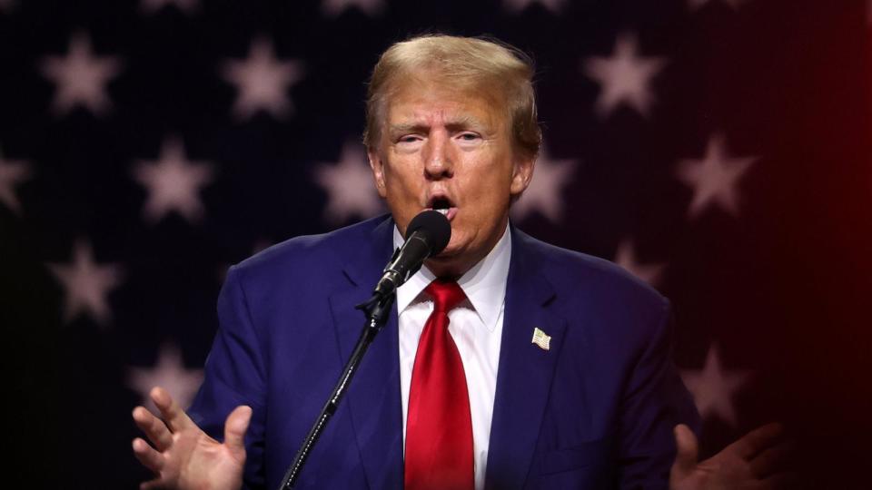 PHOTO: Republican presidential candidate former President Donald Trump delivers remarks during a campaign rally at the Reno-Sparks Convention Center, Dec. 17, 2023, in Reno, Nevada.  (Justin Sullivan/Getty Images)