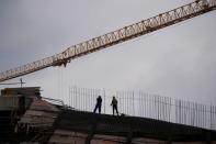 Workers work at a construction site, following the COVID-19 outbreak, in Shanghai