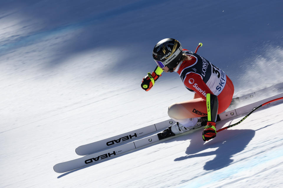 Switzerland's Lara Gut Behrami speeds down the course during the super G portion of an alpine ski, women's World Championship combined race, in Meribel, France, Monday, Feb. 6, 2023. (AP Photo/Alessandro Trovati)