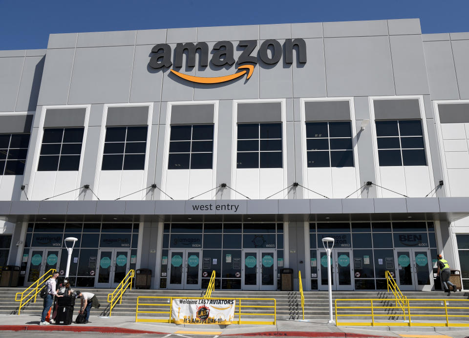 NORTH LAS VEGAS, NEVADA - MARCH 31:  An exterior view shows an Amazon fulfillment center on March 31, 2021 in North Las Vegas, Nevada. The company is offering employees COVID-19 vaccinations at the facility for eight days.  (Photo by Ethan Miller/Getty Images)