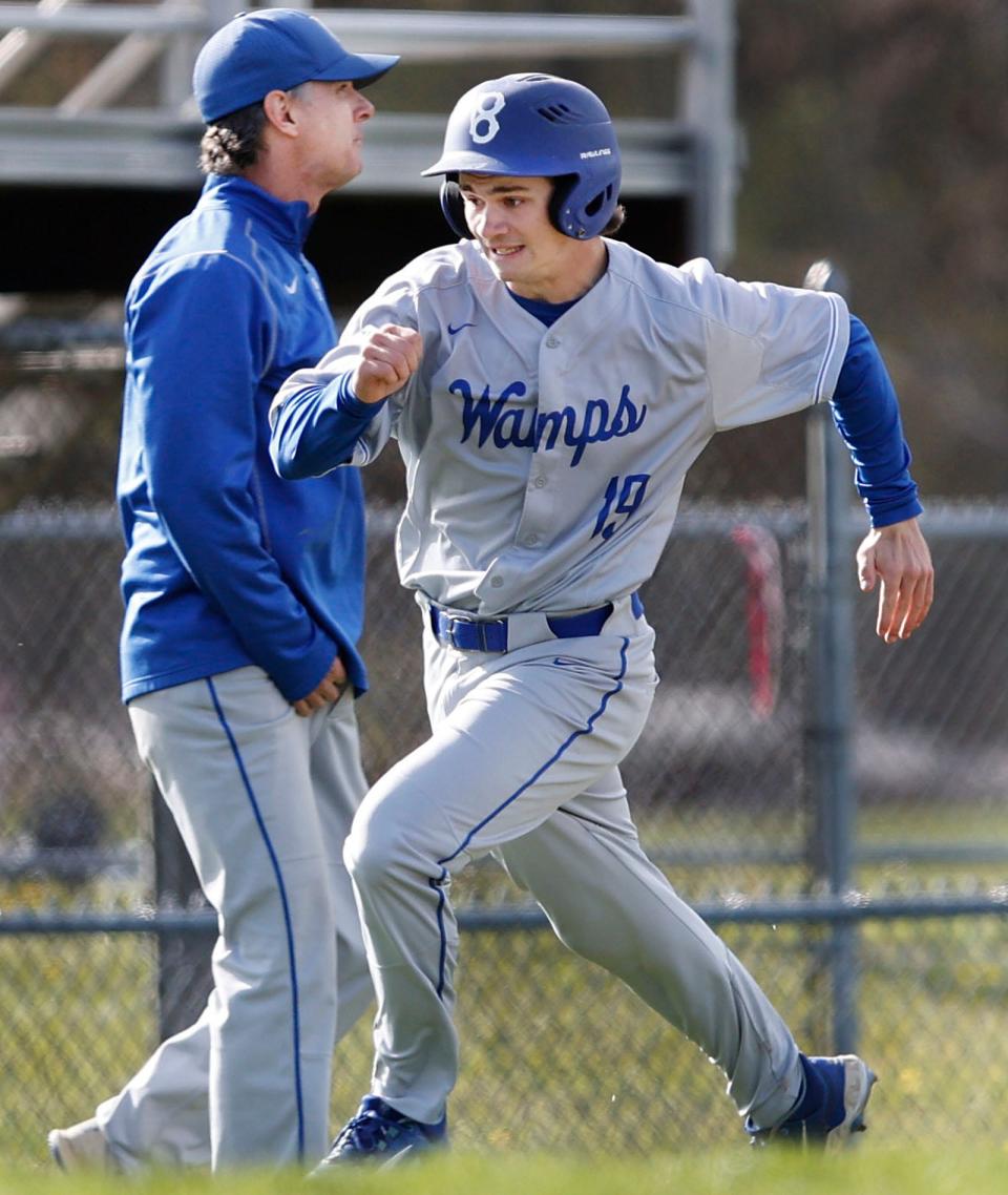 Wamps #19 Jack Titley turns the corner at third on his way home to score.

The Braintree High Wamps hosted the Framingham Flyers in baseball on Wednesday May 1, 2024