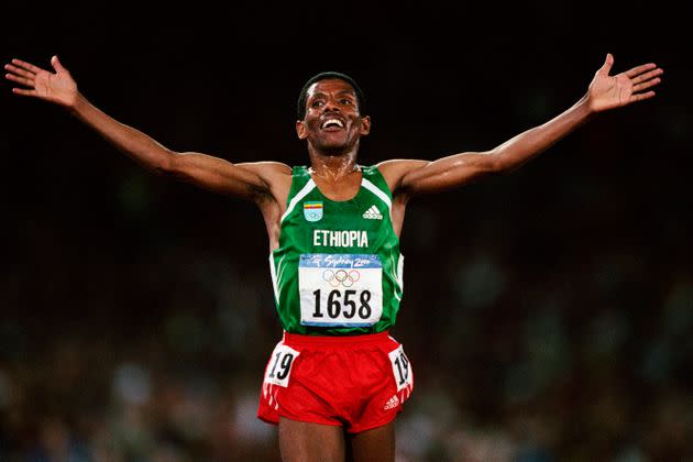 Haile Gebrselassie from Ethiopia celebrates after winning the men's 10,000-meters at the 2000 Olympics. (Photo by THIERRY ORBAN/Sygma via Getty Images) (Photo: Thierry Orban via Getty Images)