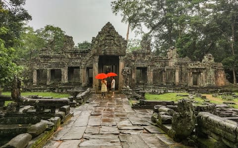 Lots of rain, not many tourists at Angkor Wat - Credit: GETTY