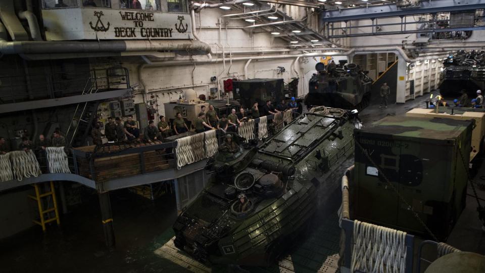 An assault amphibious vehicle assigned to the 31st Marine Expeditionary Unit transits the well deck of the amphibious transport dock ship Green Bay in 2019. (MC2 Anaid Banuelos Rodriguez/U.S. Navy)