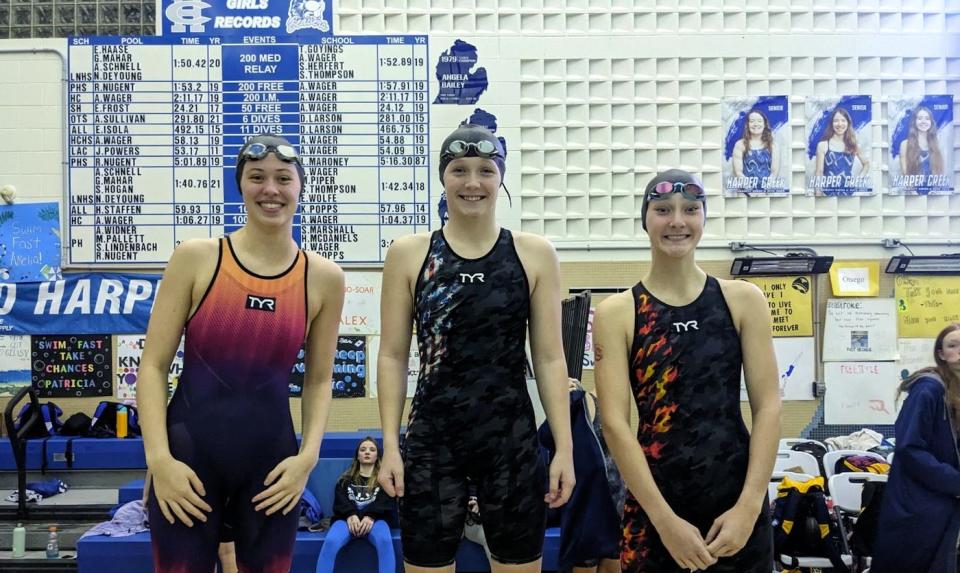 Ainsley Gump, Kaylee Draper and Emma Garbine finished with a sweep in the 100 freestyle this weekend.