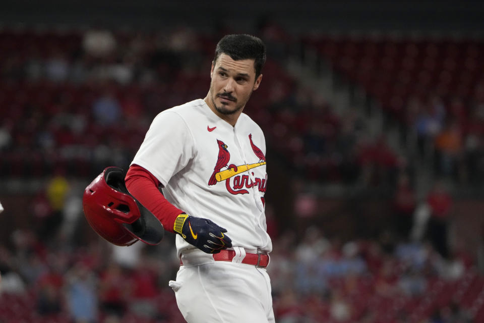 St. Louis Cardinals' Nolan Arenado tosses his helmet after flying out to end the third inning of a baseball game against the San Diego Padres Tuesday, Aug. 29, 2023, in St. Louis. (AP Photo/Jeff Roberson)