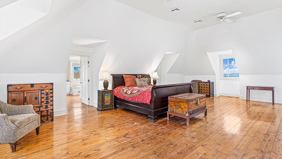 One of the home’s four massive bedrooms.