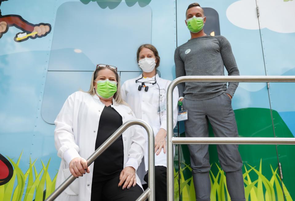 Scenes from the Mask Off Outreach event outside of Robberson Elementary School on Saturday, May 22, 2021. The free event featured a food giveaway, bbq, haircuts, manicures, face painting, as well as COVID-19 vaccinations and a dental clinic provided by Jordan Valley.