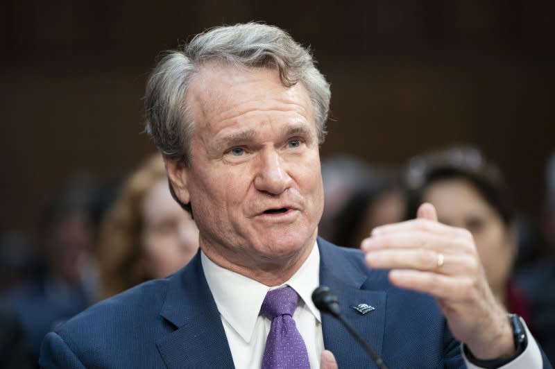 Chairman and CEO of Bank of America Brian Thomas Moynihan testifies during a Senate Banking, Housing and Urban Affairs committee oversight hearing examining Wall Street firms at the U.S. Capitol in Washington, D.C., on Wednesday. He said higher capital requirements for banks means they would have to charge customers more in order to maintain high returns. Photo by Bonnie Cash/UPI