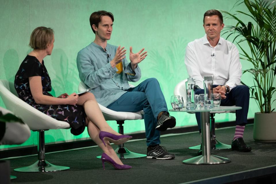 Nicholas Hawker of First Light Fusion and Warrick Matthews of Tokamak Energy speak with Valerie Jamieson of the UK Atomic Energy Authority at the Climate Tech Summit on Tuesday 13 June 2023 (Aidan Synnott / London Tech Week)