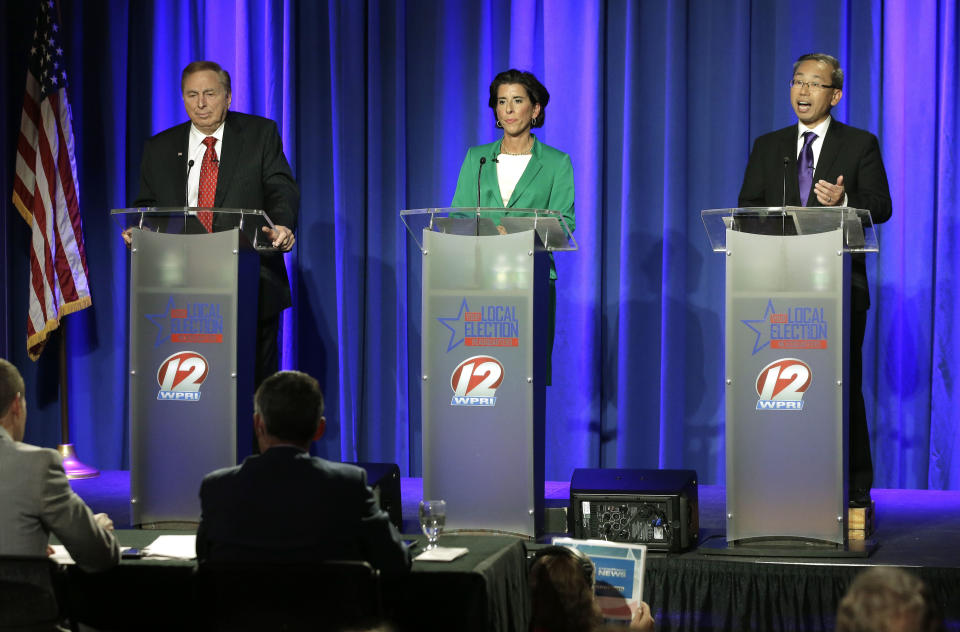 Rhode Island gubernatorial candidates, from left, former state Rep. Joseph Trillo, who is running as an independent, Democratic Gov. Gina Raimondo, and Republican Cranston Mayor Allan Fung, participate in a televised debate, Thursday, Sept. 27, 2018, in Bristol, R.I. (AP Photo/Steven Senne)