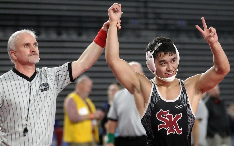 South Kitsap's Mitchell Neiner took first place over Skyview's Owen Pritchard for their 138-pound championship bout during Mat Classic Championships at the Tacoma Dome on Saturday, Feb. 18, 2023. Neiner finished as a two-time state champion for the Wolves.