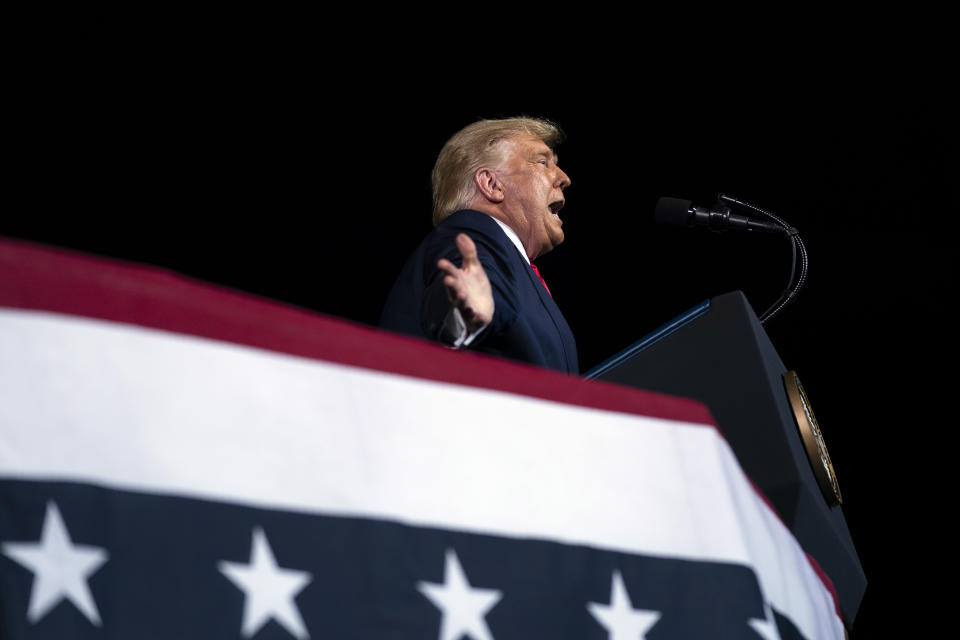 President Donald Trump speaks during a campaign rally at Pensacola International Airport, Friday, Oct. 23, 2020, in Pensacola, Fla. (AP Photo/Evan Vucci)