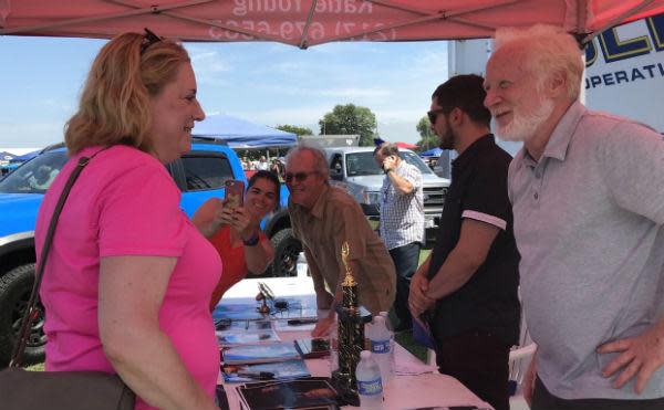 Mike Lookinland, center, who starred as Bobby Brady on "The Brady Bunch," and Donny Most, right, who played Ralph Malph on "Happy Days," greet fans at the 2019 Powerlight Abe Lincoln Car and Bike Show.