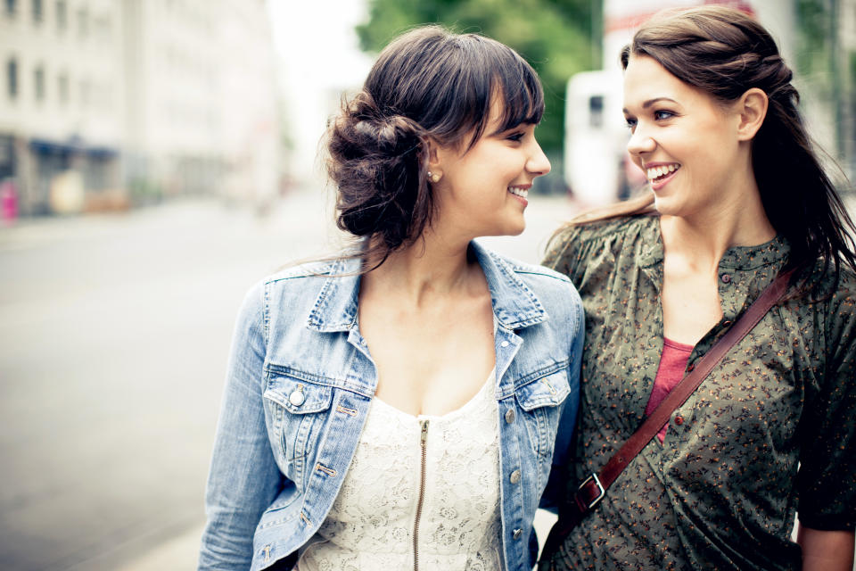 Two women smiling (Getty Images)