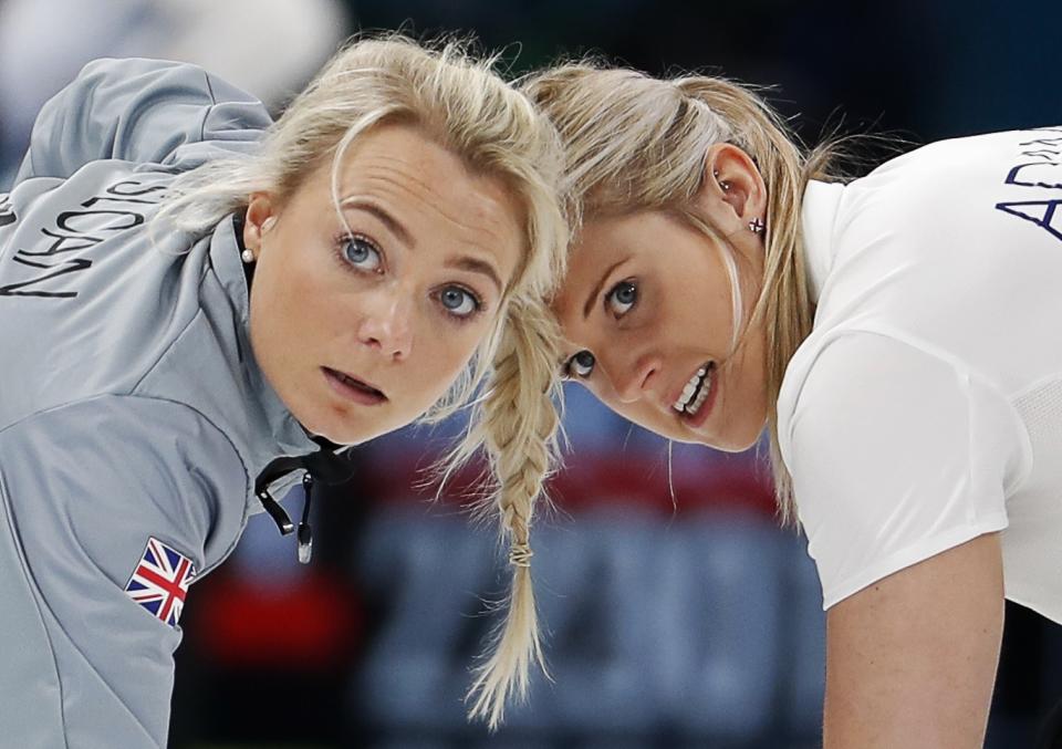 <p>Anna Sloan and Vicki Adams of Britain sweep. REUTERS/Cathal McNaughton </p>