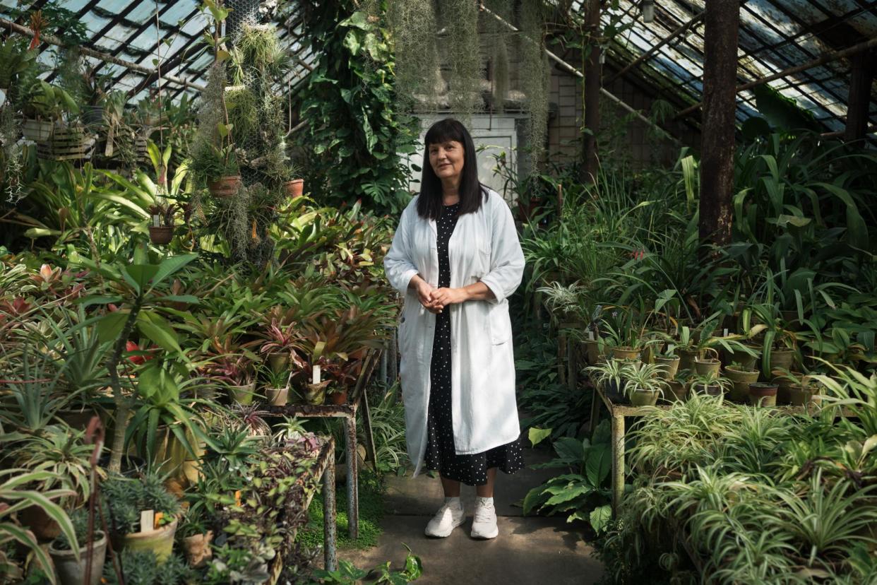 <span>Zhanna Yaroslavska inside a greenhouse at the Mykola Hryshko national botanical garden in Kyiv.</span><span>Photograph: Anastasia Vlasova/The Guardian</span>