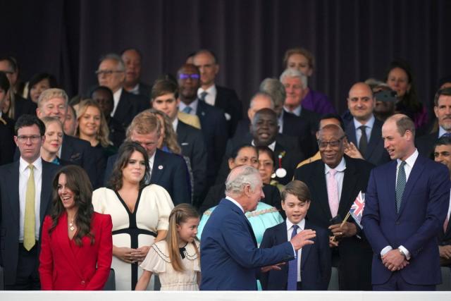 Three generations of royals share a moment in the crowd (AP)