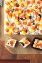 <p> Not only is this dessert super sweet, but it also has a touch of salt for a tasty balance. </p><p><a href="https://www.womansday.com/food-recipes/food-drinks/recipes/a11819/candy-corn-fudge-recipe-123647/" rel="nofollow noopener" target="_blank" data-ylk="slk:Get the Candy Corn Fudge recipe.;elm:context_link;itc:0;sec:content-canvas" class="link "><strong><em>Get the Candy Corn Fudge recipe. </em></strong> </a></p>