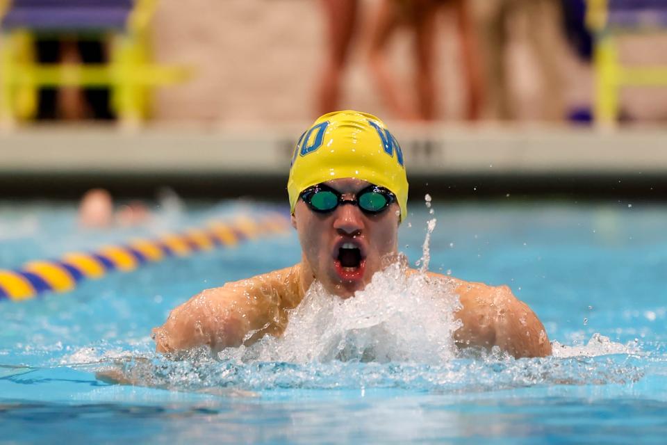 Luke Boucher perfectly executes the butterfly part of the race as he leads the 200 IM.