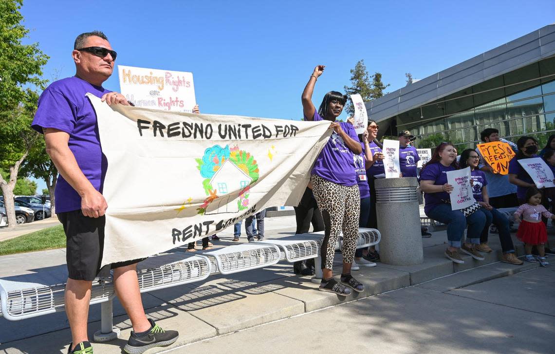 A coalition of unhoused, youth, families, and faith leaders gather outside Fresno City Hall for a rally urging council members and the mayor to address the housing crisis, including rent control and tenant protections and pass immediate, long-term housing solutions, on Thursday, April 27, 2023.