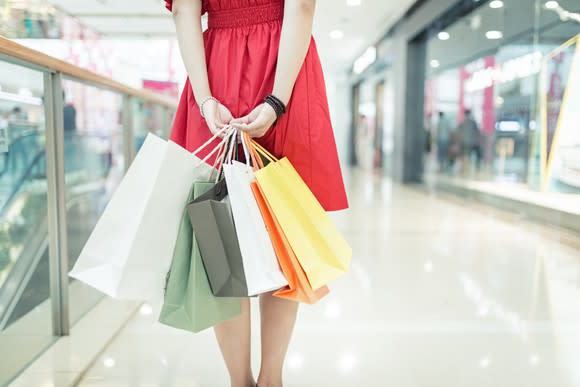 A woman shops in a mall.