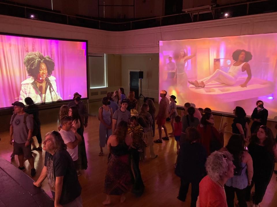 The film "X-VOTIVE" featuring the soulful Burlington band Acqua Mossa plays June 4, 2022 on surrounding screens at Contois Auditorium in Burlington City Hall as part of the Burlington Discover Jazz Festival.