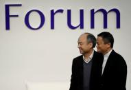 SoftBank Group founder and CEO Masayoshi Son and Alibaba founder and former Chairman Jack Ma attend the Tokyo Forum 2019 in Tokyo