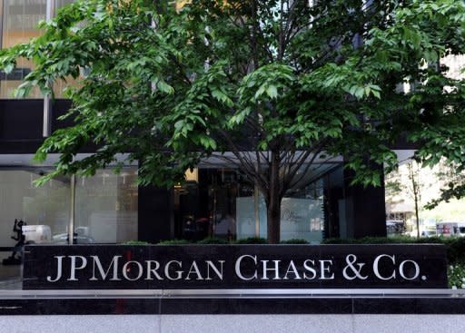 Sign outside the JP Morgan Chase building on Park Avenue in New York. JPMorgan Chase's shares were pummeled and politicians blasted its CEO Jamie Dimon after the bank reported a shock $2 billion derivatives loss that even the pugnacious chief executive called "egregious."