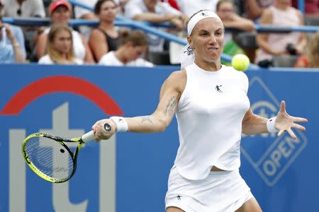 Aug 5, 2018; Washington, DC, USA; Svetlana Kuznetsova of Russia hits a forehand against Donna Vekic of Croatia (not pictured) in the women's singles final in the Citi Open at Rock Creek Park Tennis Center. Kuznetsova won 4-6, 7-6(7), 6-2. Mandatory Credit: Geoff Burke-USA TODAY Sports