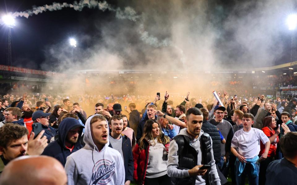 Luton Town fans on the pitch after their Championship play-off semi-final victory over Sunderland at Kenilworth Road - ‘Erling Haaland? We’ve got a special s--- entrance for him’ – Luton gear up for Premier League - Getty Images/Marc Atkins