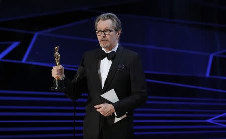 90th Academy Awards - Oscars Show – Hollywood - Gary Oldman holds his Best Actor Oscar for Darkest Hour. REUTERS/Lucas Jackson