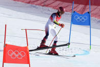Mikaela Shiffrin of United States loses control and skis off course during the first run of the women's giant slalom at the 2022 Winter Olympics, Monday, Feb. 7, 2022, in the Yanqing district of Beijing. (AP Photo/Robert F. Bukaty)